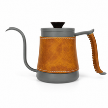 Grey gooseneck kettle with a brown leather body sleeve and handle wrap