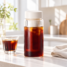 Cold brew bottle in a bright home setting