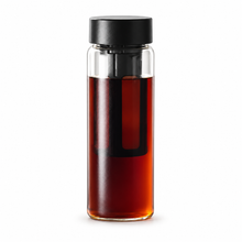 560 ml black cold brew coffee bottle with black lid and filter on a white background