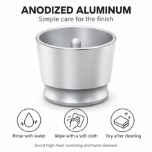 Anodized aluminum espresso dosing cup with water rinse and soft cloth care instructions