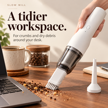 Slow Mill portable cordless vacuum — desk